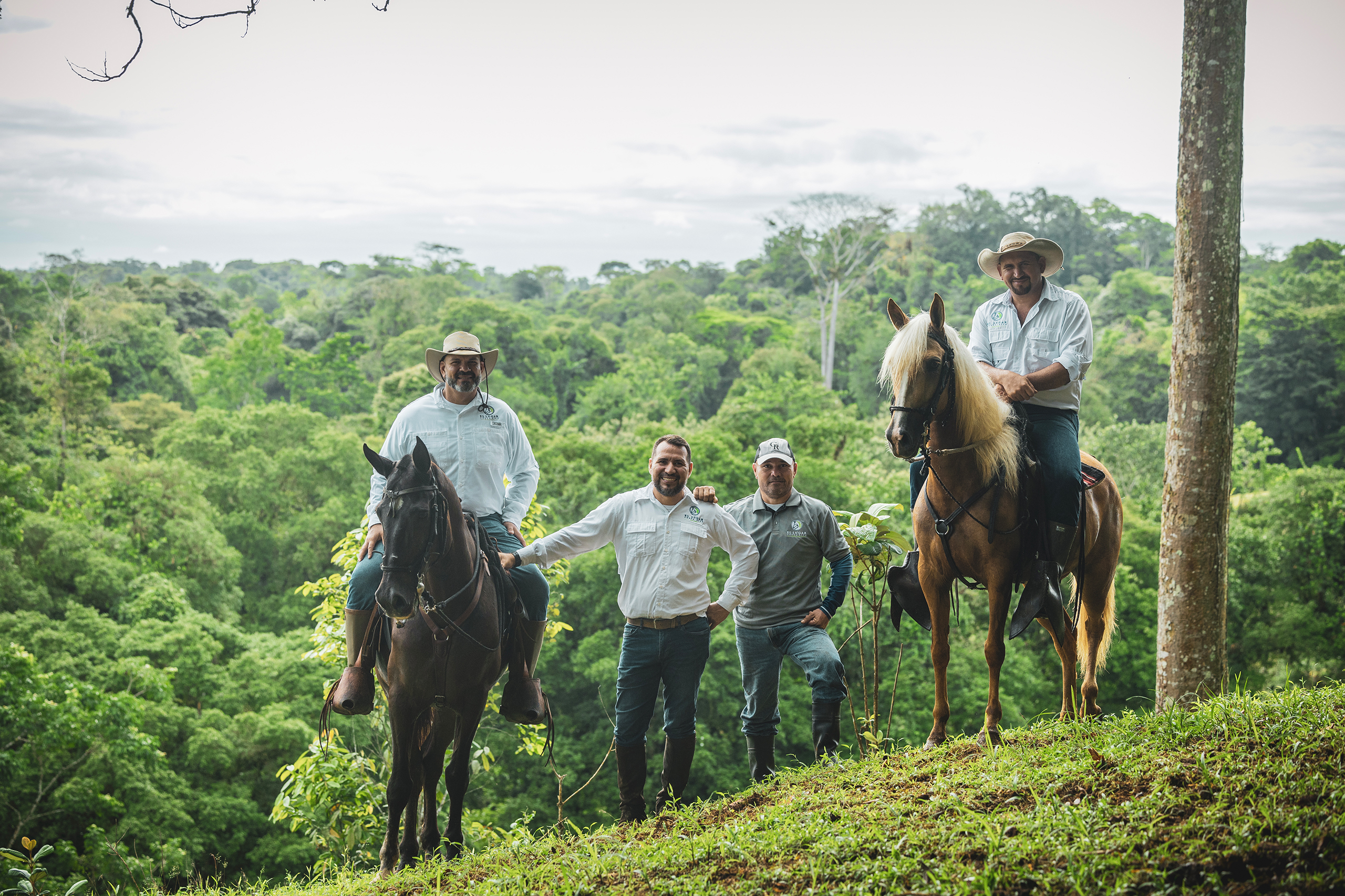 El Lugar staff with horses